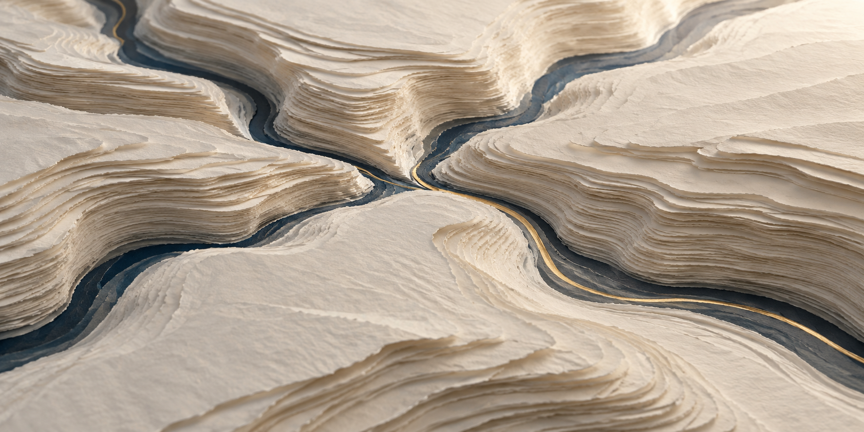 Layered paper forms crossed by deep channels and a fine gold line